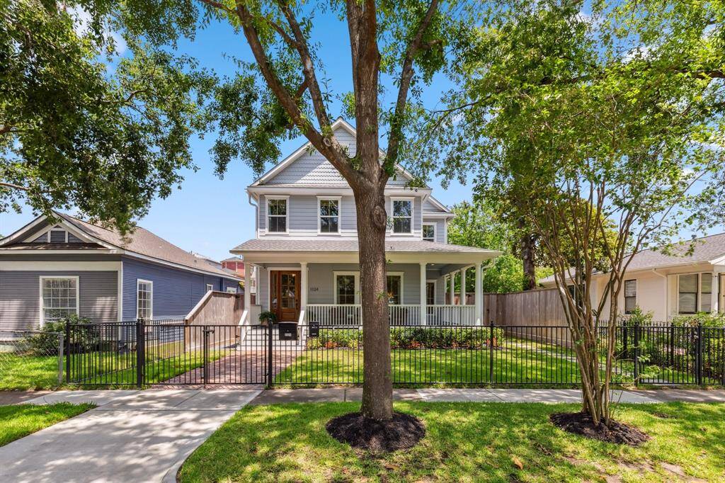 A new wrought iron fence and irrigated landscaping add wonderful curb appeal to this meticulously maintained home featuring fresh exterior paint, new porch railings, and new gutters with leaf guards.