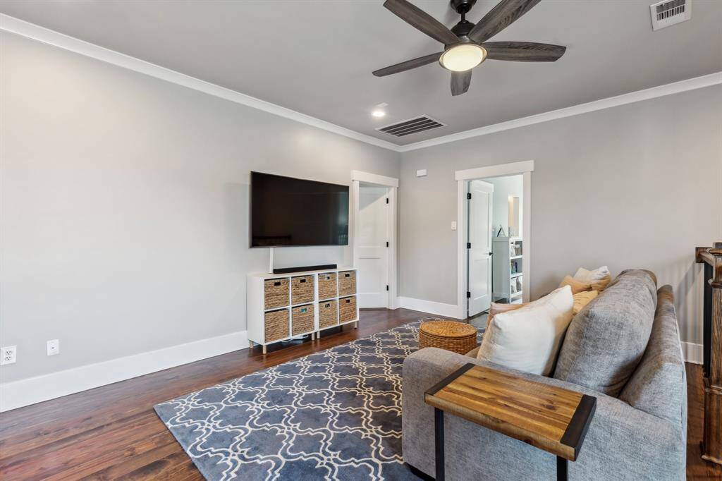 Plan cozy movie nights in the upper-level game room.