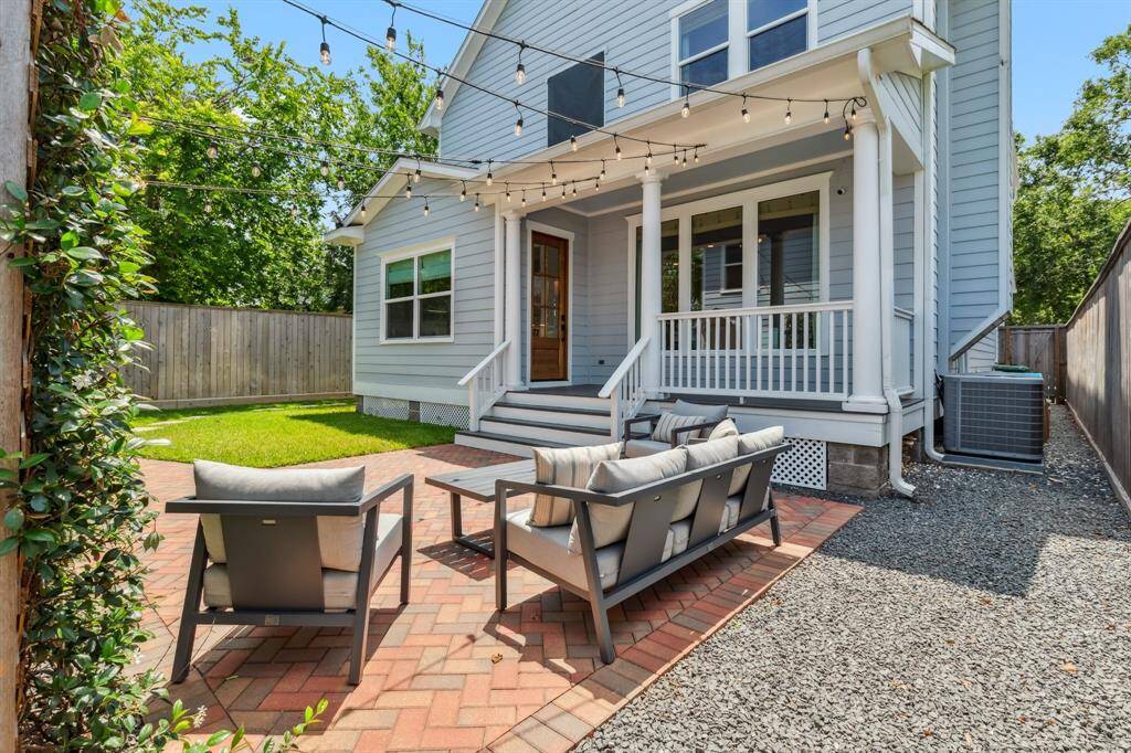Claim this charming, easy-care outdoor space just in time for summer and enjoy a new custom brick patio, 8-foot-tall cedar fencing, and irrigated landscaping.