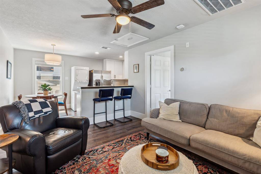 Perched atop the garage, this beautifully updated one-bedroom, one-bathroom garage apartment is perfect for guests or renters.