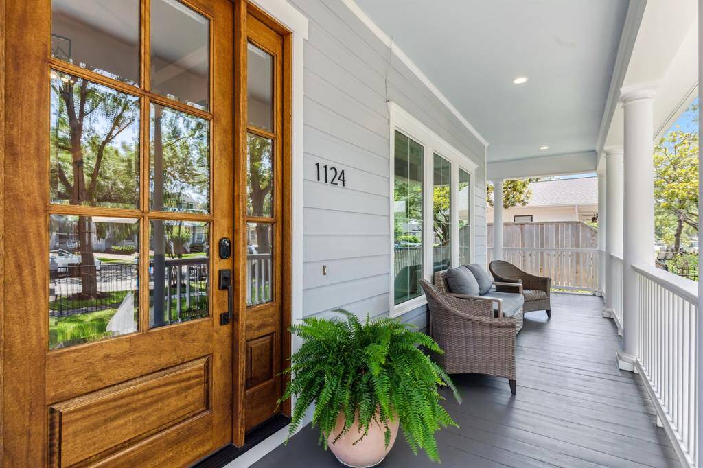 Imagine summer evenings on this west-facing porch finished with recessed lighting.