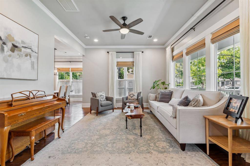 Enjoy a seamless layout for entertaining featuring a spacious living room that flows to the lovely formal dining room.