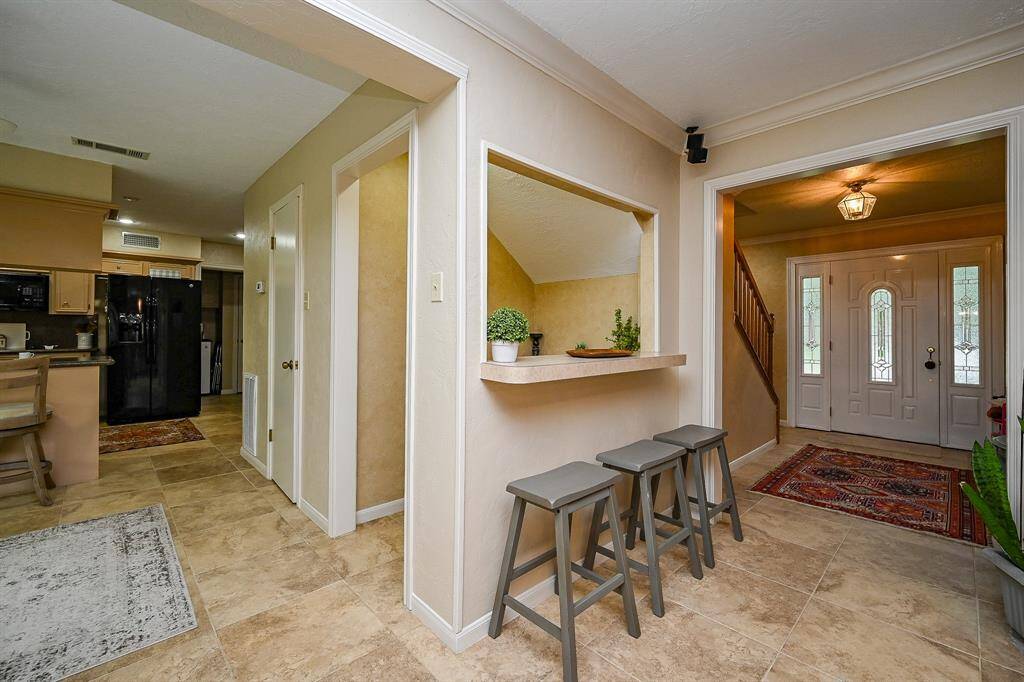 Open dry bar to family room