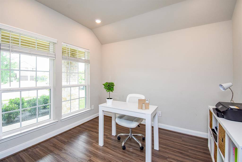 Huge double windows bring pure natural sunshine into this divine front home office/study off the main hallway; and/or an additional bedroom if needed or desired.