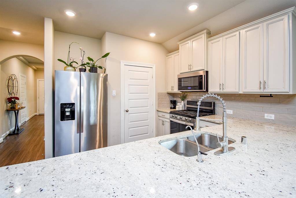 Sleek walkways in and around kitchen areas, allows you to view comings and goings from entry to living area, patio and beyond.