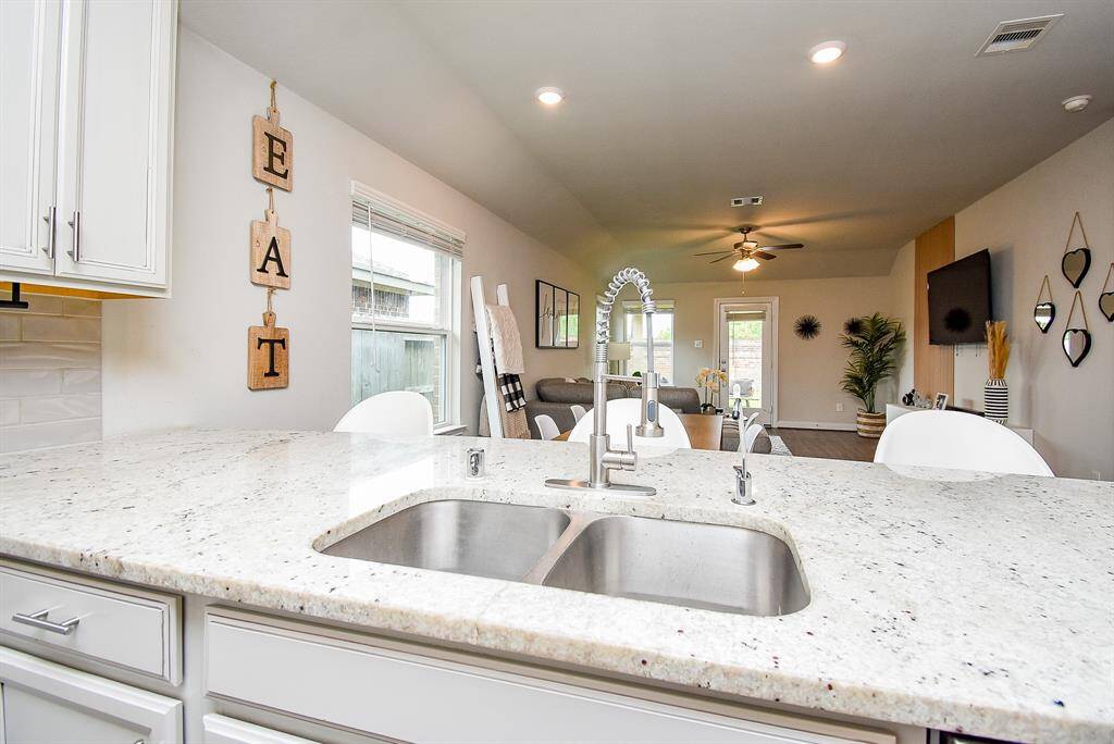 Smile and pop open that celebratory bottle of champagne, while guests toast your new home!