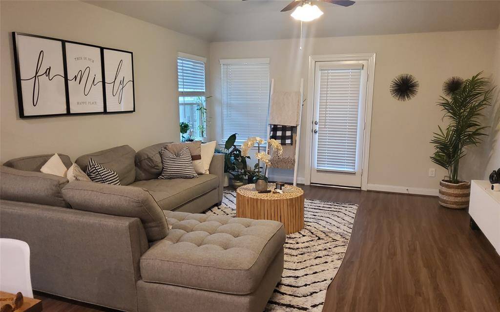 This lovely living area easily accommodates overstuffed, oversized living pieces!