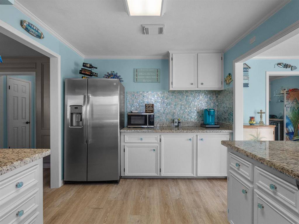 Extra counterspace and cabinets for a coffee bar, wine bar or just extra storage.