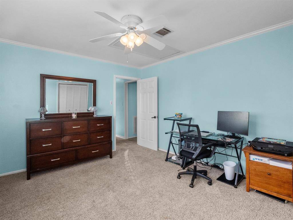 Secondary bedroom on second floor being used as an office