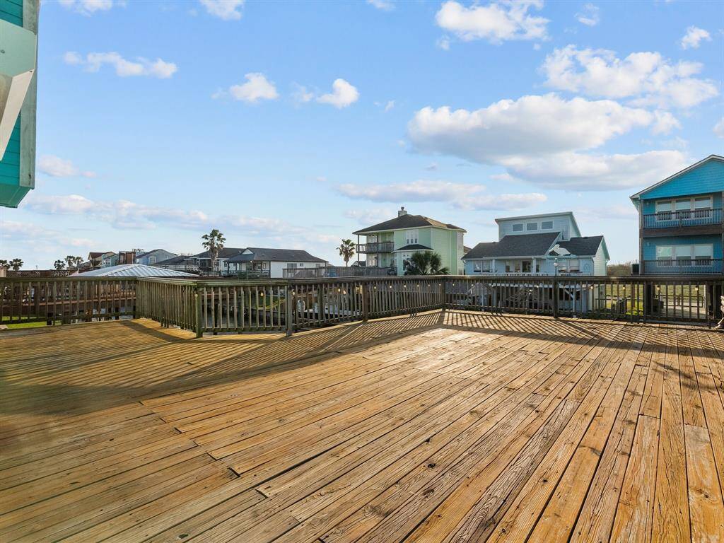 Check out the view all the way down the canal and out to the bay! The lighting around the deck makes this place beautiful at night!