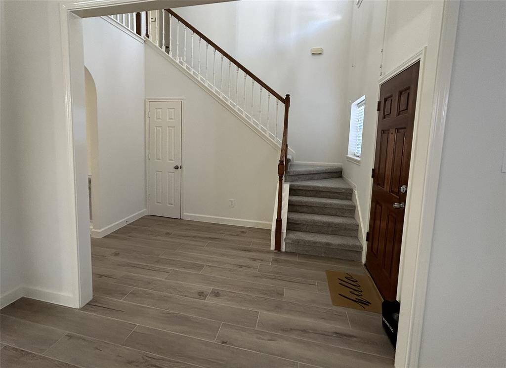 New porcelain tile throughout the first floor