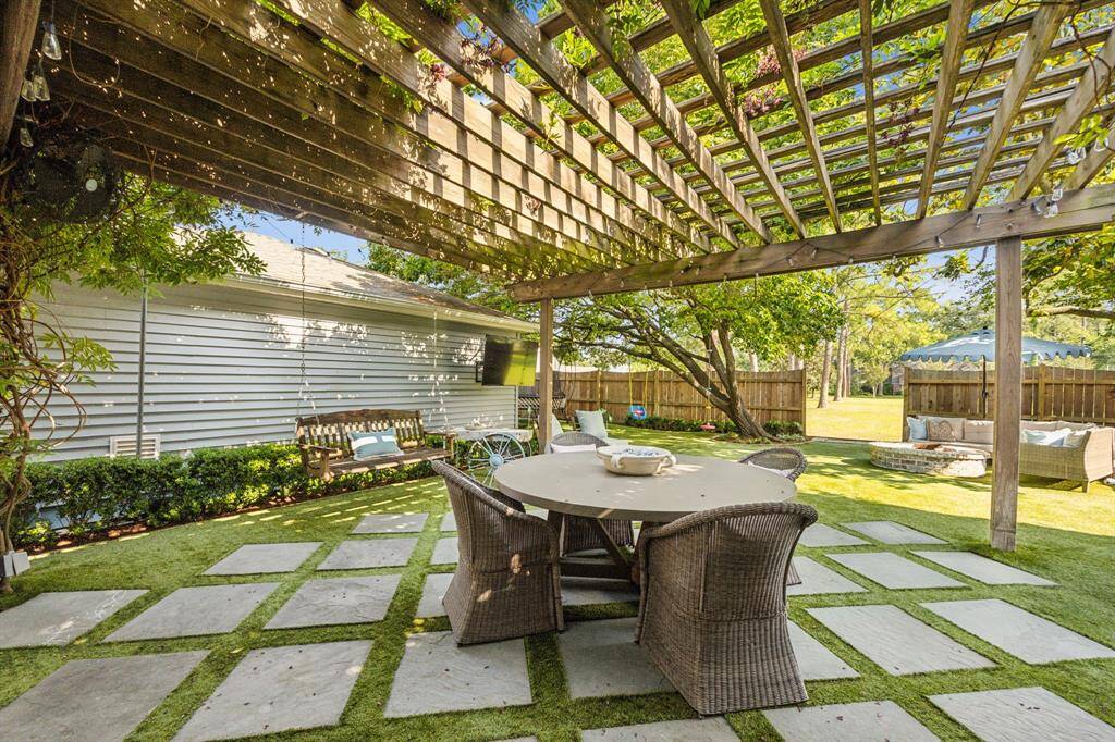 Enjoy quiet evenings in this spacious backyard with seamless access to the field behind the home. NO BACK NEIGHBORS.