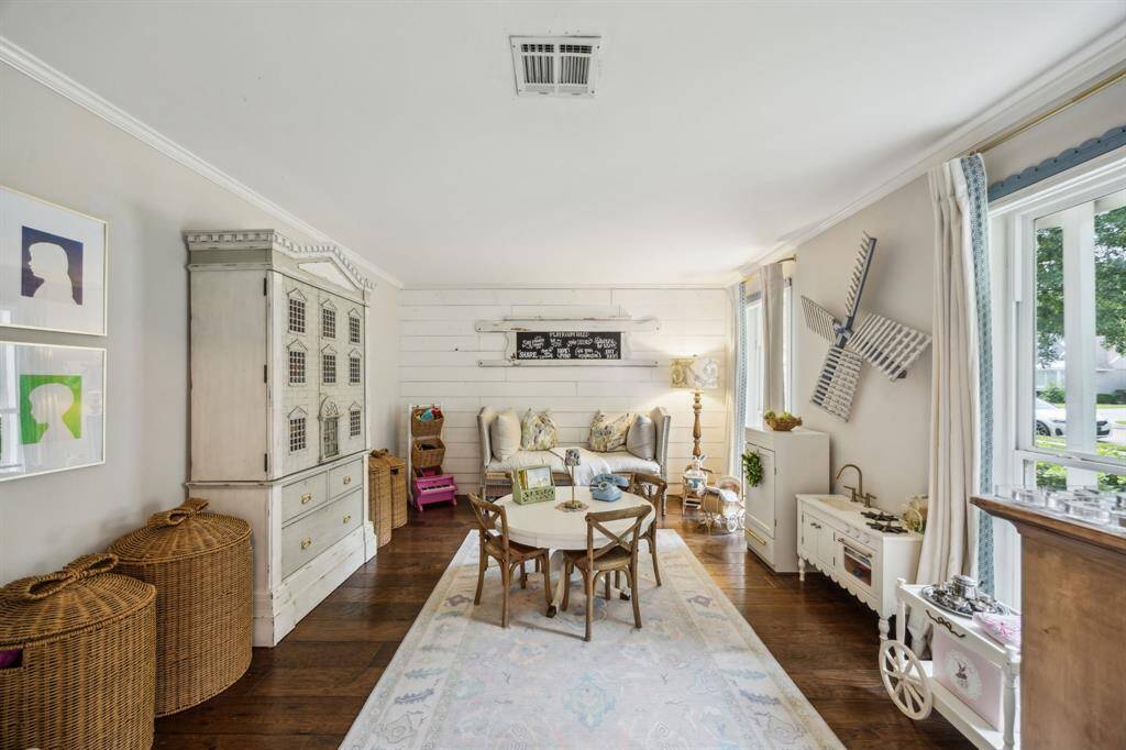 This space is being used as a play room but would work great as a dining room with plenty of space for a large dining table.