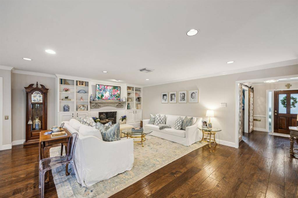 Appreciate the gleaming hardwoods which continue throughout the first floor.