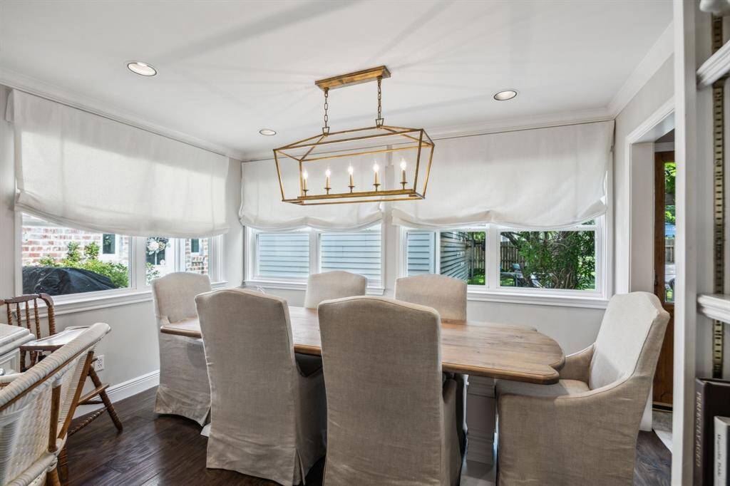 Breakfast room just off the kitchen boasts incredible views of the backyard.