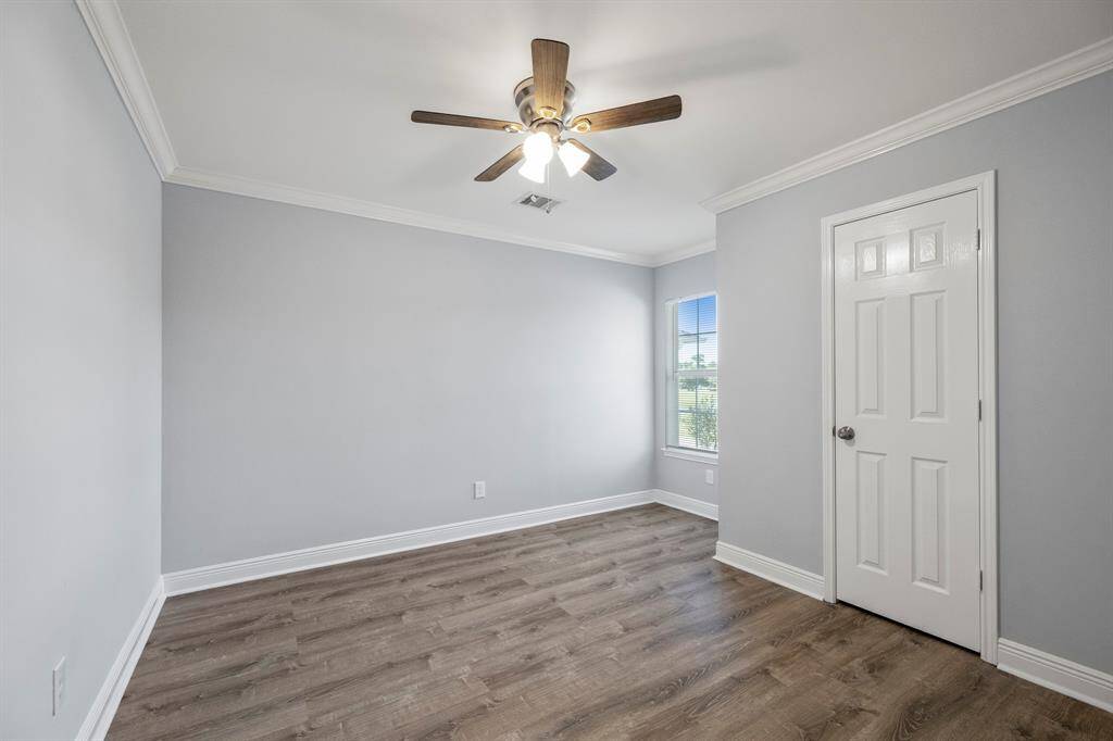 The generously sized third bedroom offers comfort, versatility, and room to grow. Whether used as a guest suite, home office, or additional family bedroom, this space provides plenty of square footage to suit your needs.