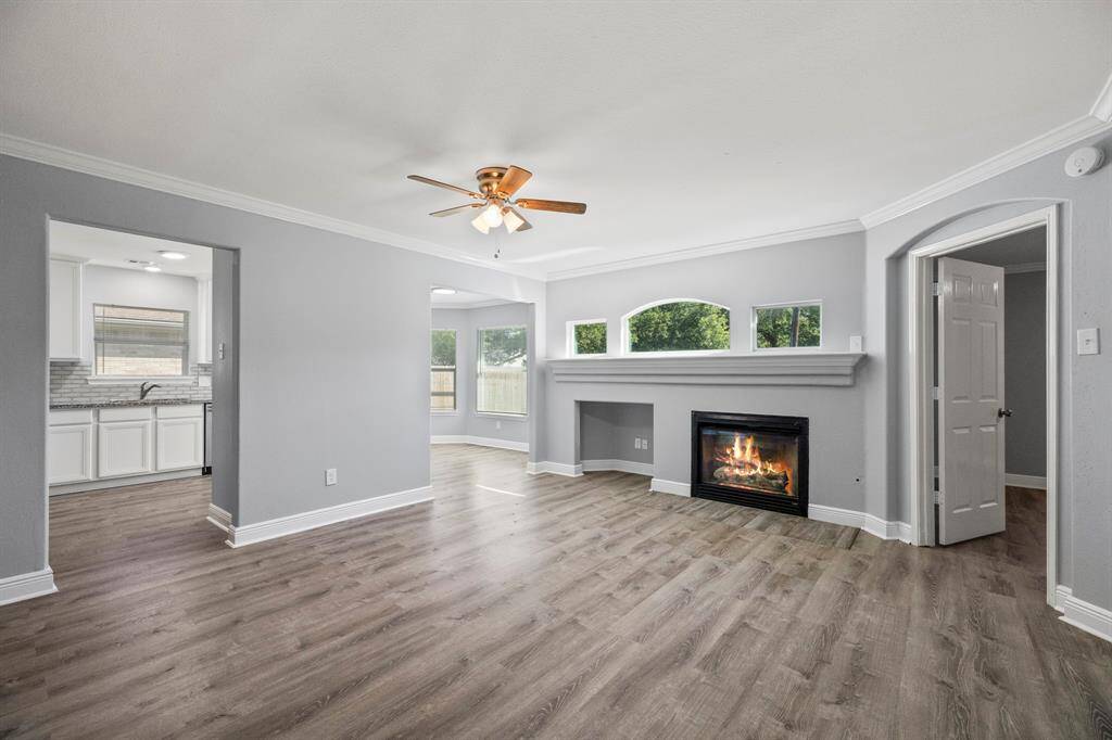 From the breakfast nook is this breathtaking view into the heart of the home emphasizing the open-concept feel.