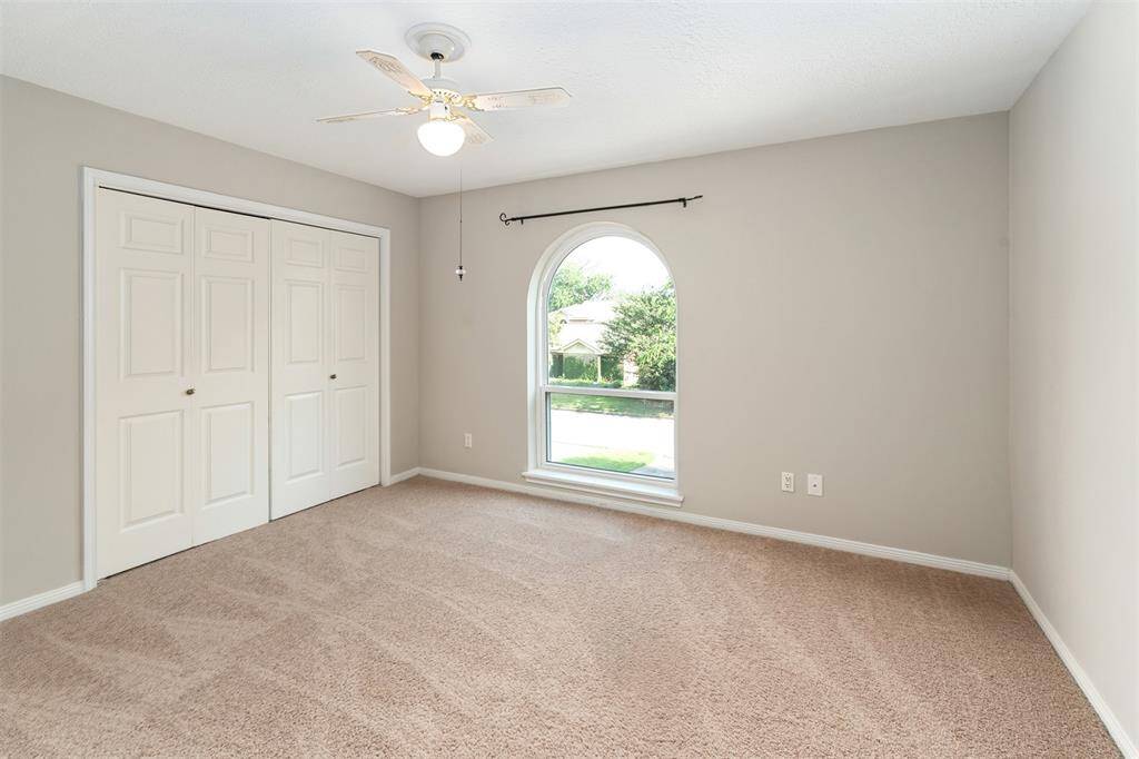This bedroom overlooks the street scene on Skyknoll.
