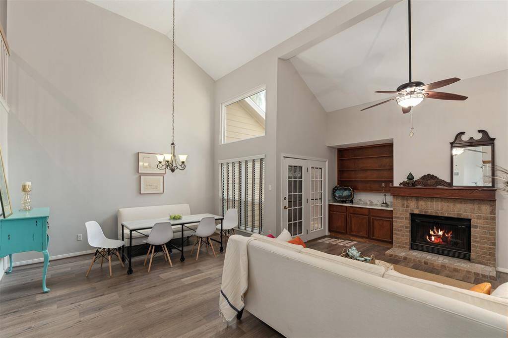 Large windows bring in plenty of natural light to the living / dining areas.