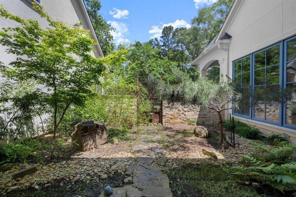 The view of the Japanese courtyard garden can be seen from multiple rooms inside the home.