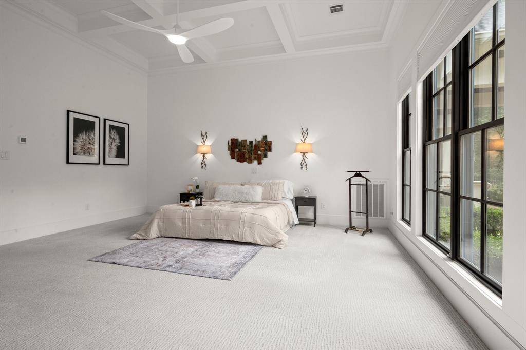 The motorized blackout shades and remote-operated ceiling fan/light provide added convenience.