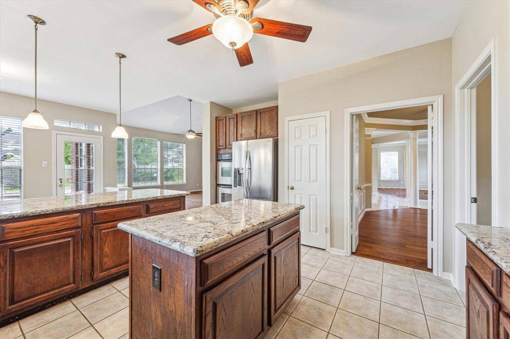 The kitchen with a view into the dining room. Convenient for entertaining!