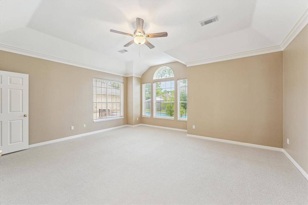 Another view of the primary bedroom.