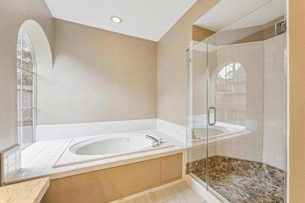 Tub and separate shower.