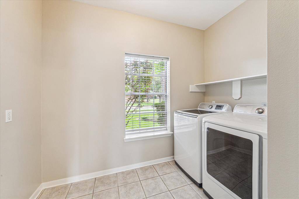 Laundry room is located off the kitchen.