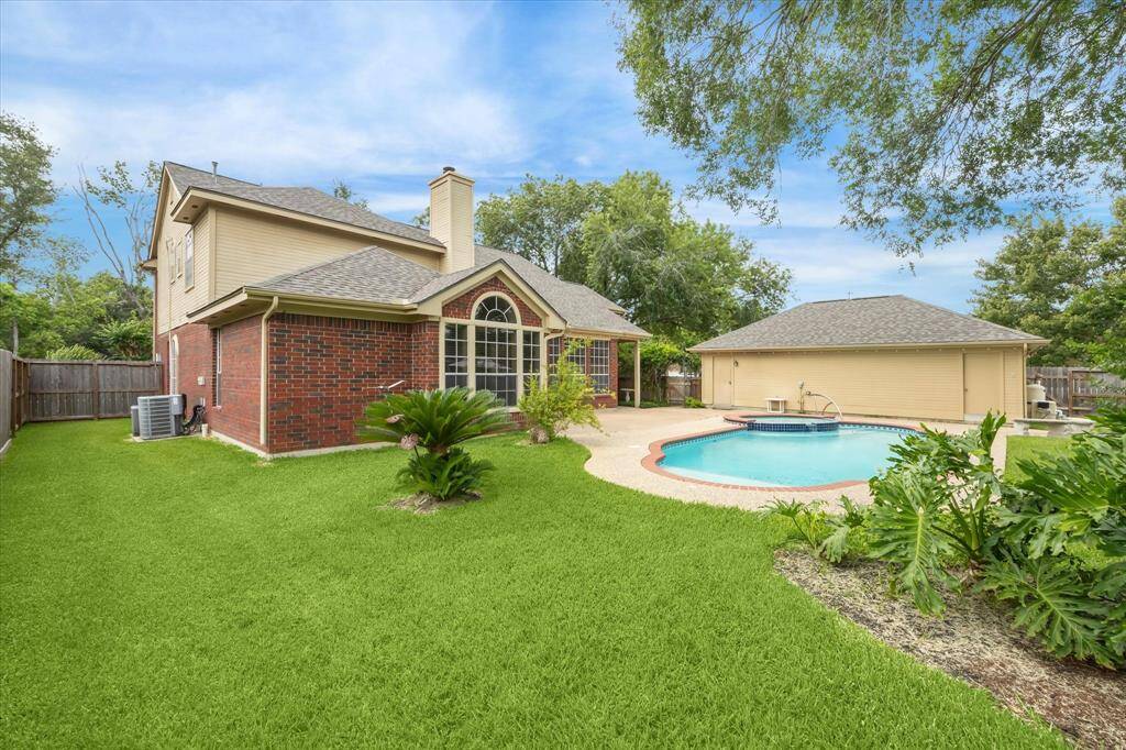 Vacation year round in this lovely backyard!