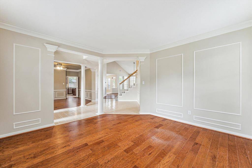 View from the formal living into the dining and family rooms.