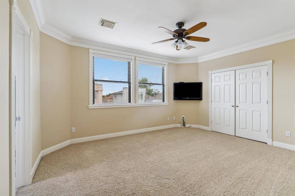Secondary bedroom on third floor with ensuite bath.