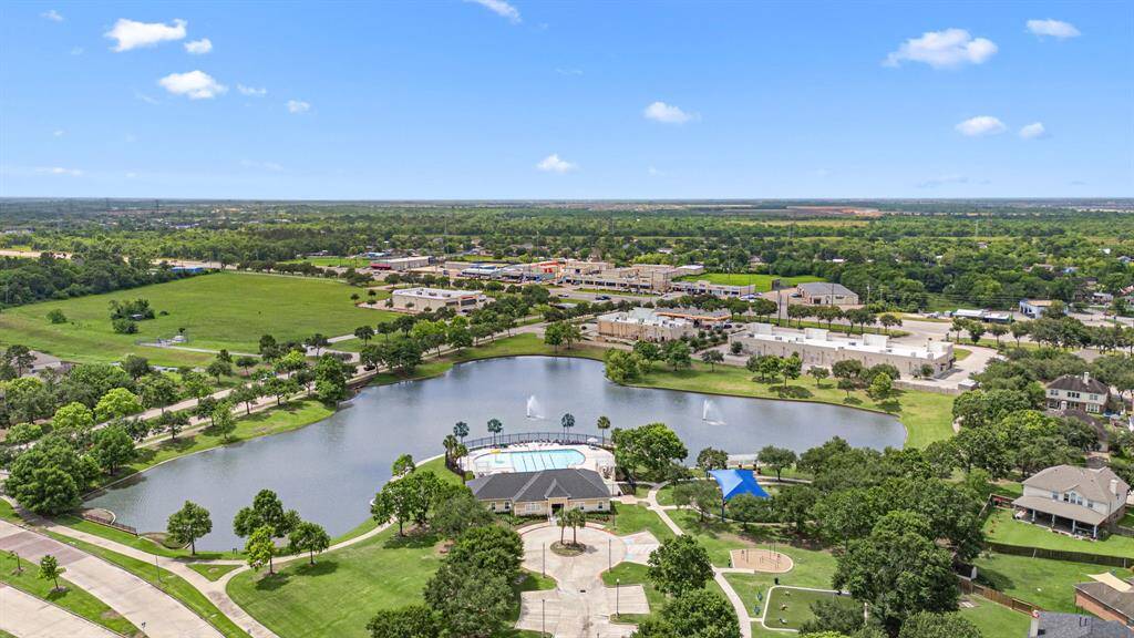 Large neighborhood pond, pool, club house and splash pad.