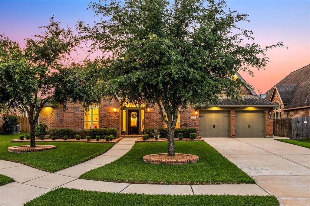 Welcome home to 13909 Morgan Bay Drive located on a quiet cul-de-sac street in Shadow Creek ranch and zoned to Fort Bend ISD! This stunning home has lovely curb appeal, a well-manicured lawn, beautiful landscaping, brick elevation, dark stained front door with glass detailing, covered front porch, traditional style, beautiful outdoor lanterns and a double wide driveway!