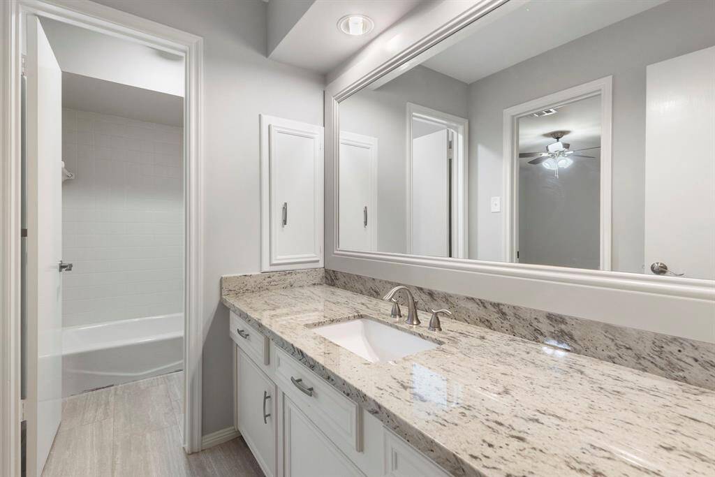 One of the two secondary bathrooms up.