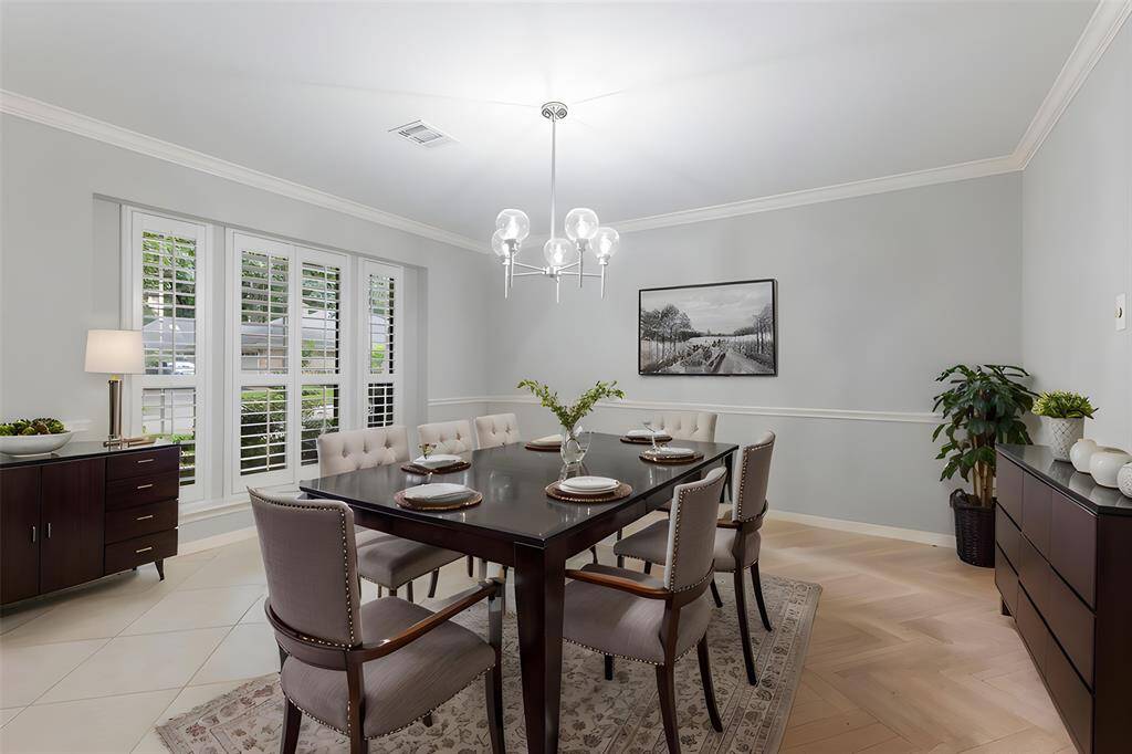 Virtually Staged Formal Dining room.