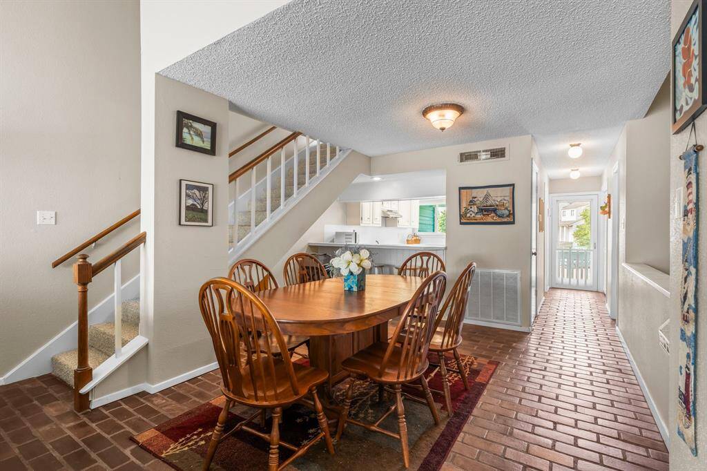 Dining area with stairway leading to level 3