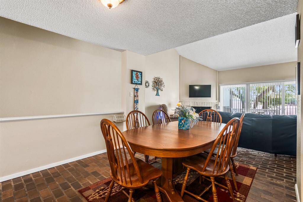 Dining Room opens to living area at top of the entry stairs
