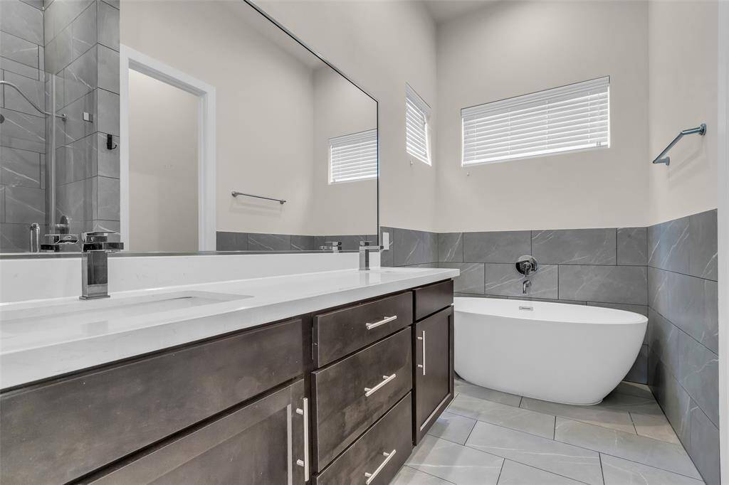 Spa-like primary bath with soaking tub.