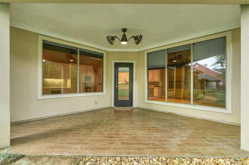 Enjoy the evening breezes on the covered back patio.