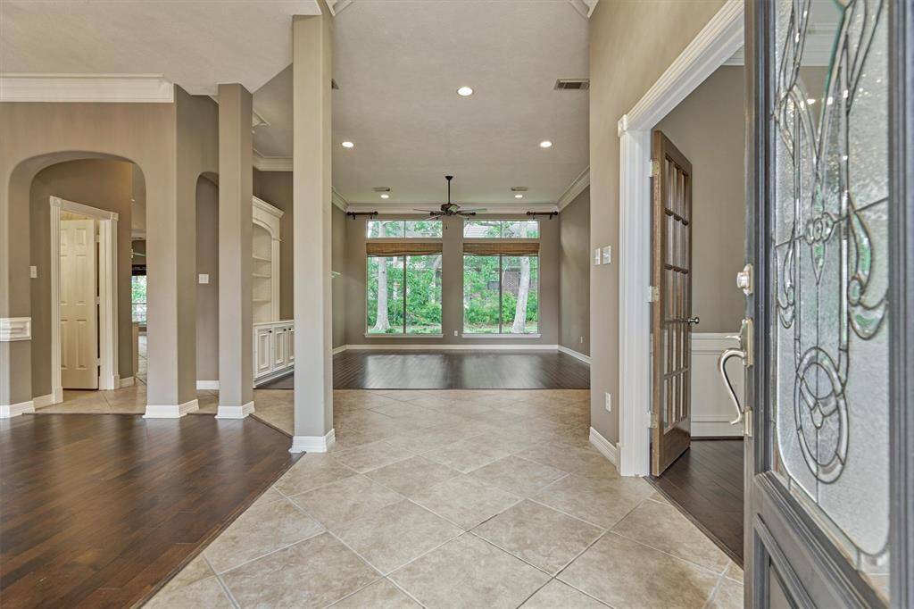 Warm and welcoming entrance into this lovely home. The study is to the right and dining is to the left.