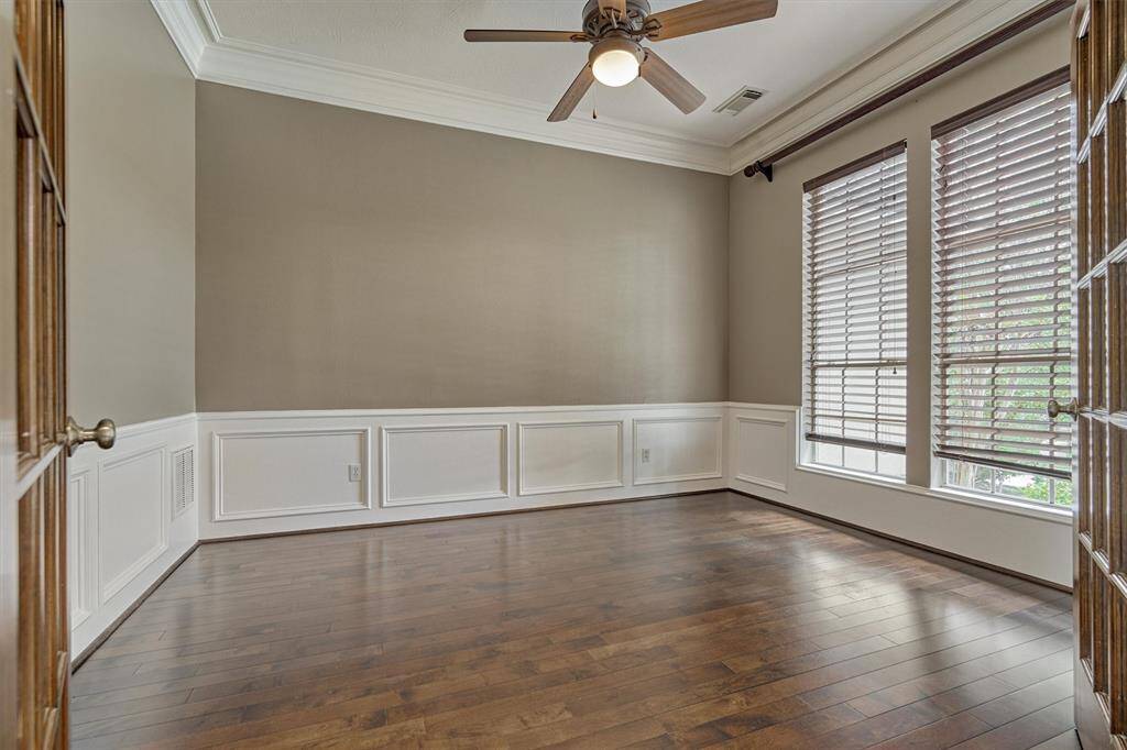 Double French doors open to the bright and spacious study.