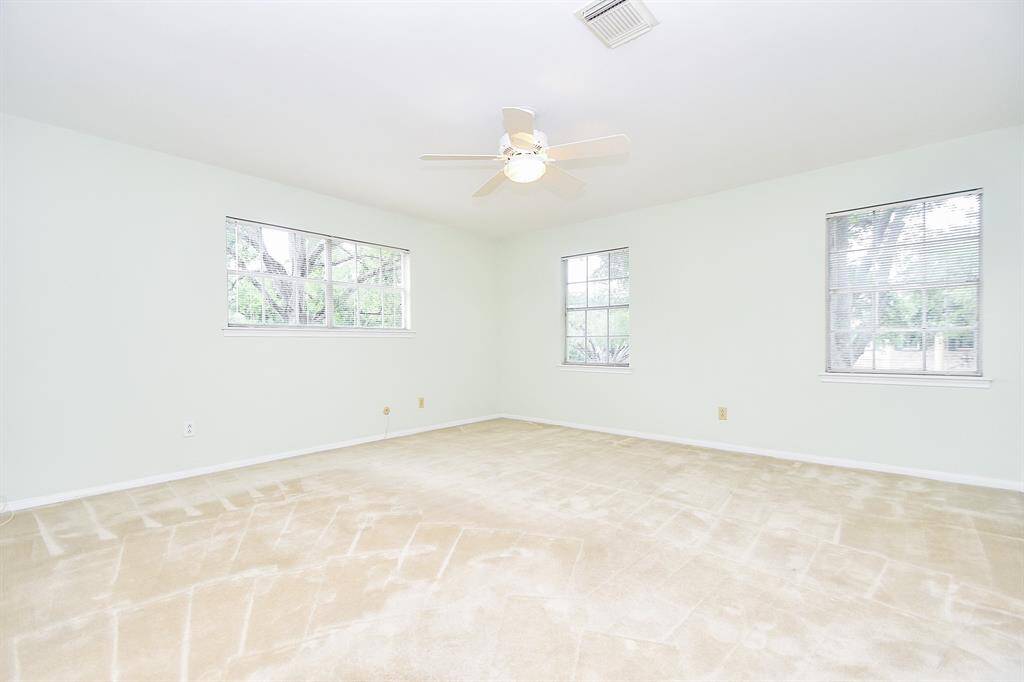 The primary bedroom has wonderful natural light.