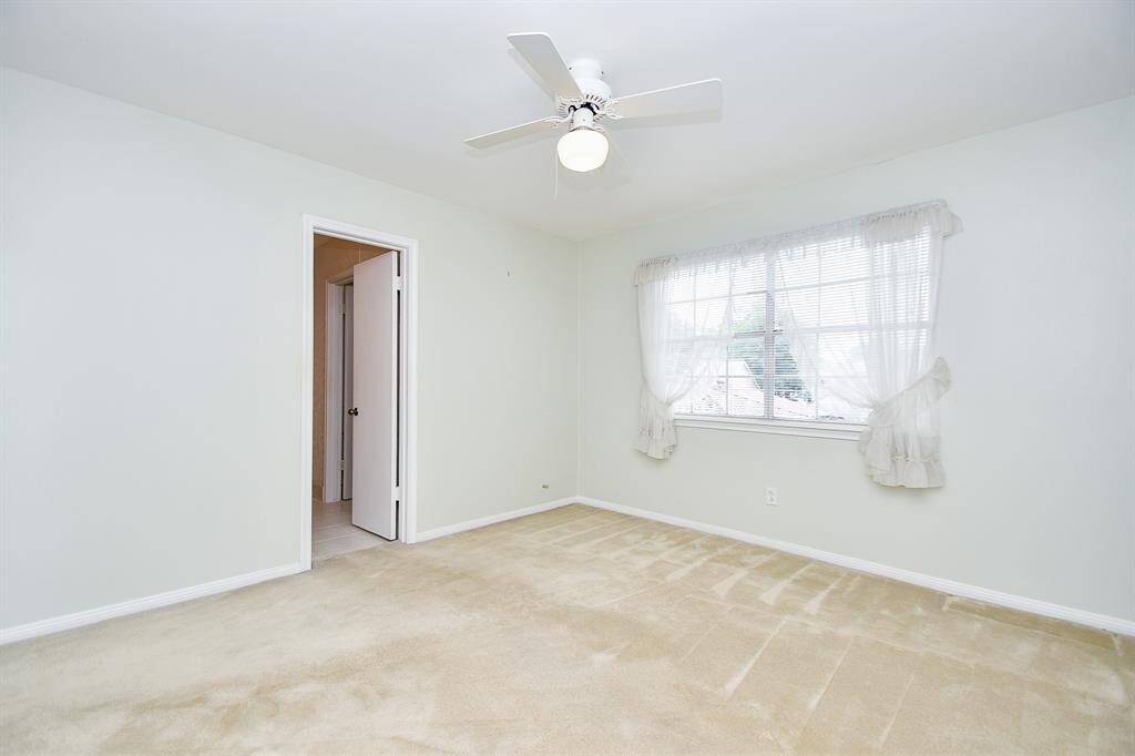 Two of the secondary bedrooms share a Hollywood bath.