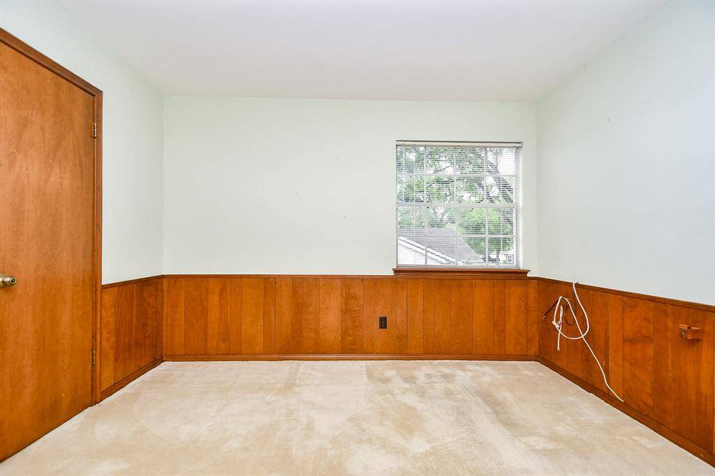This bedroom could be used as a study.
