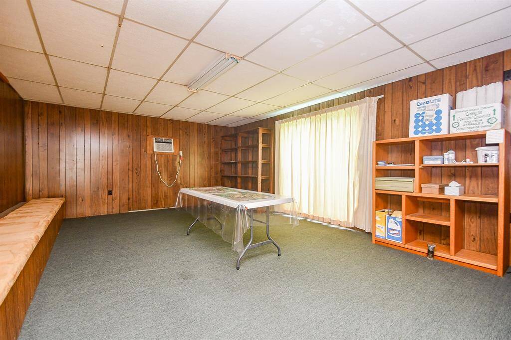 The bonus game room off the garage is plumbed and could be finished as a guest suite or studio.
