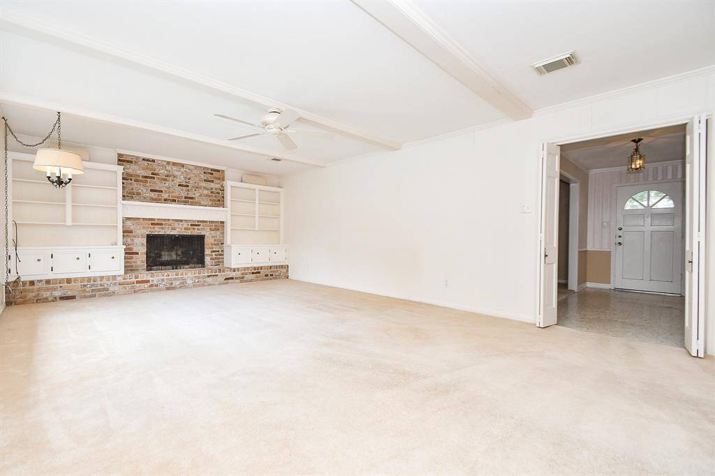 The family room has a wood burning fireplace.