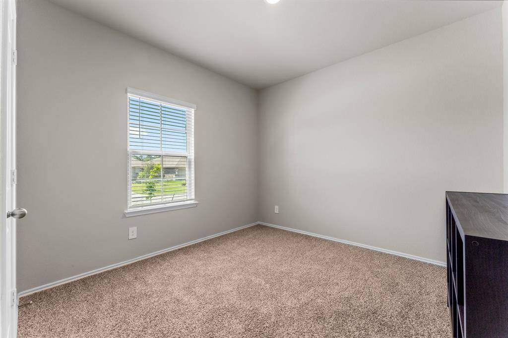 Downstairs bedroom located in the front of the house.