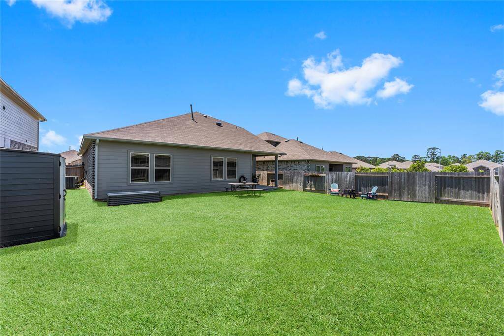 Large backyard and storage shed.