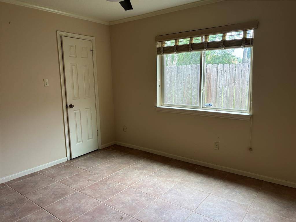 Bedroom 2 has pretty natural lighting & pool view
